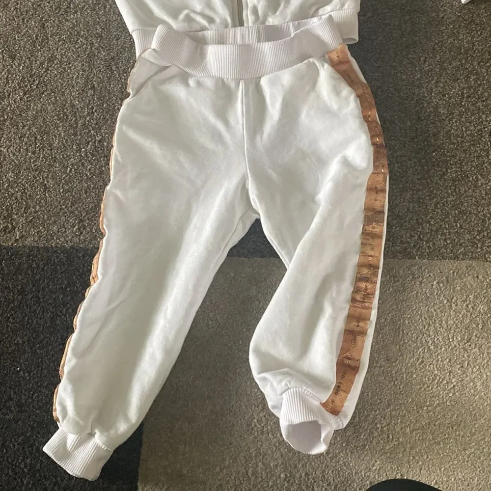 White tracksuit for girls by Alviero Martini 18 -24 m